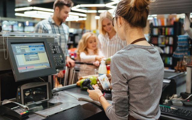 beautiful-family-standing-at-the-cash-counter.jpg